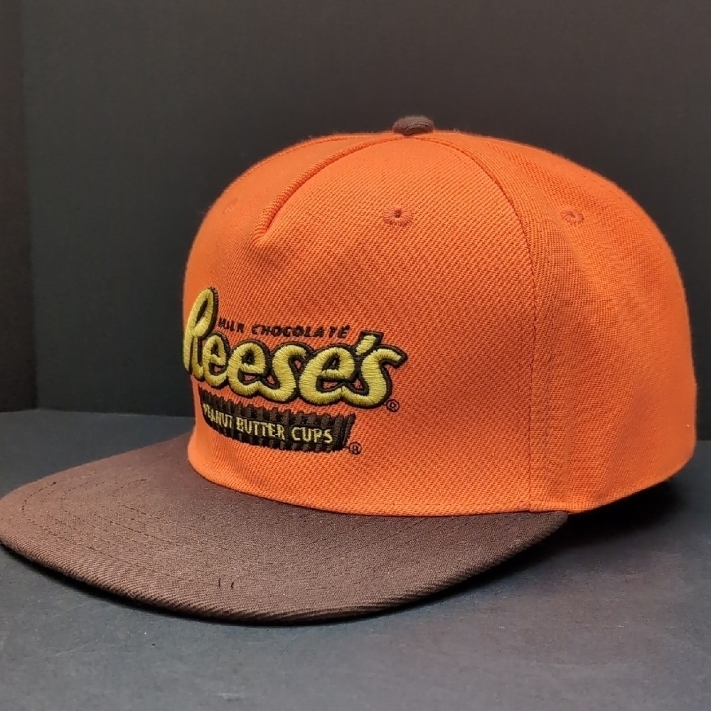 Reese's Pieces Men's Orange/Brown Flat Bill Snapback Hat .